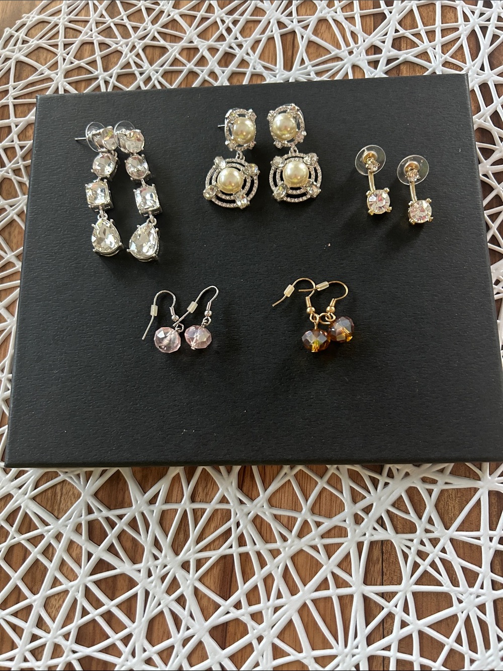 Bundle of 5 pairs of rhinestone and fake pearl and bead earrings.